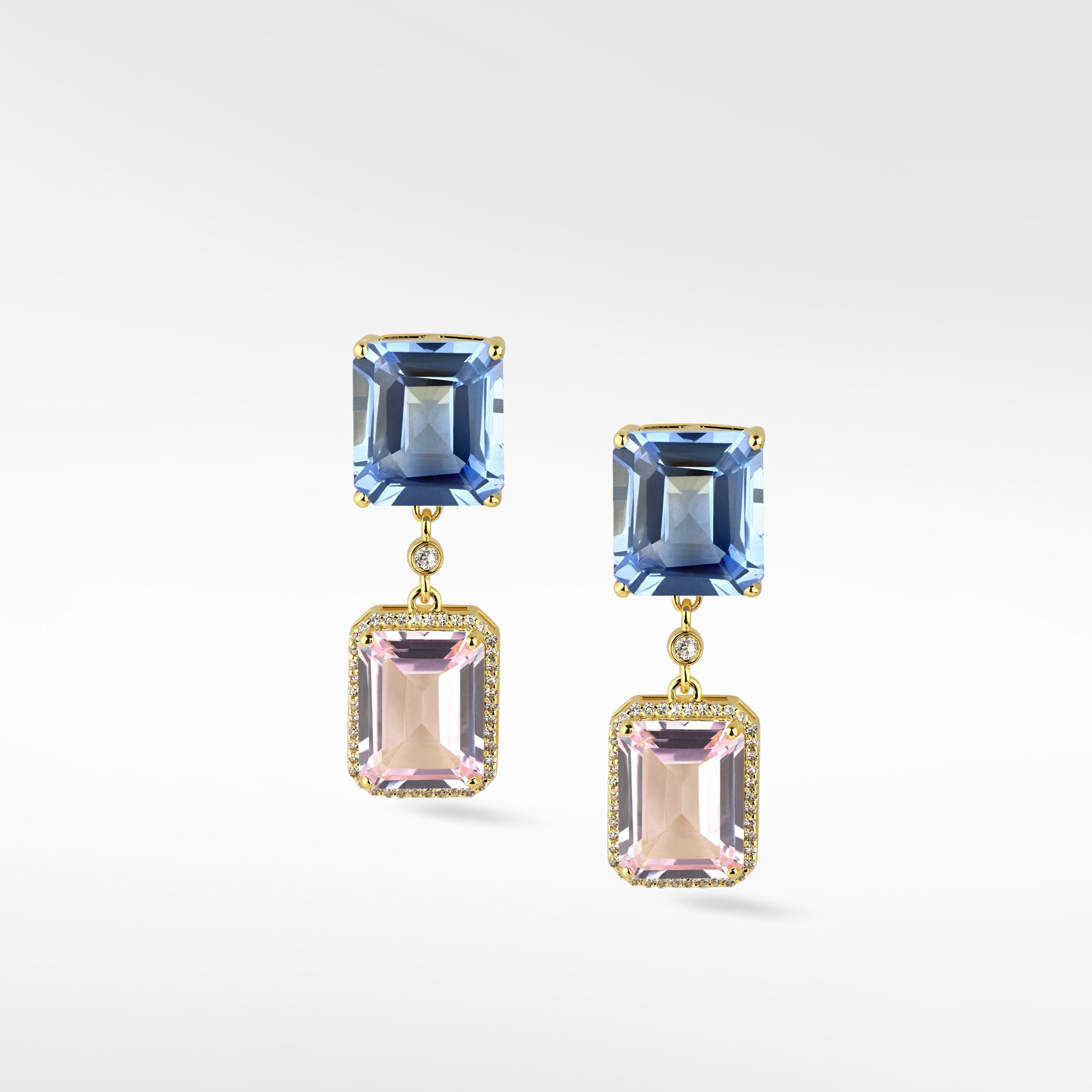 Gold Blueberry Daiquiri Earrings with blue and pink step-cut gemstones in a dangle design with a diamond halo.
