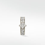 A 14k white gold hoop earring featuring a central princess-cut diamond, flanked by smaller channel-set princess-cut diamonds.