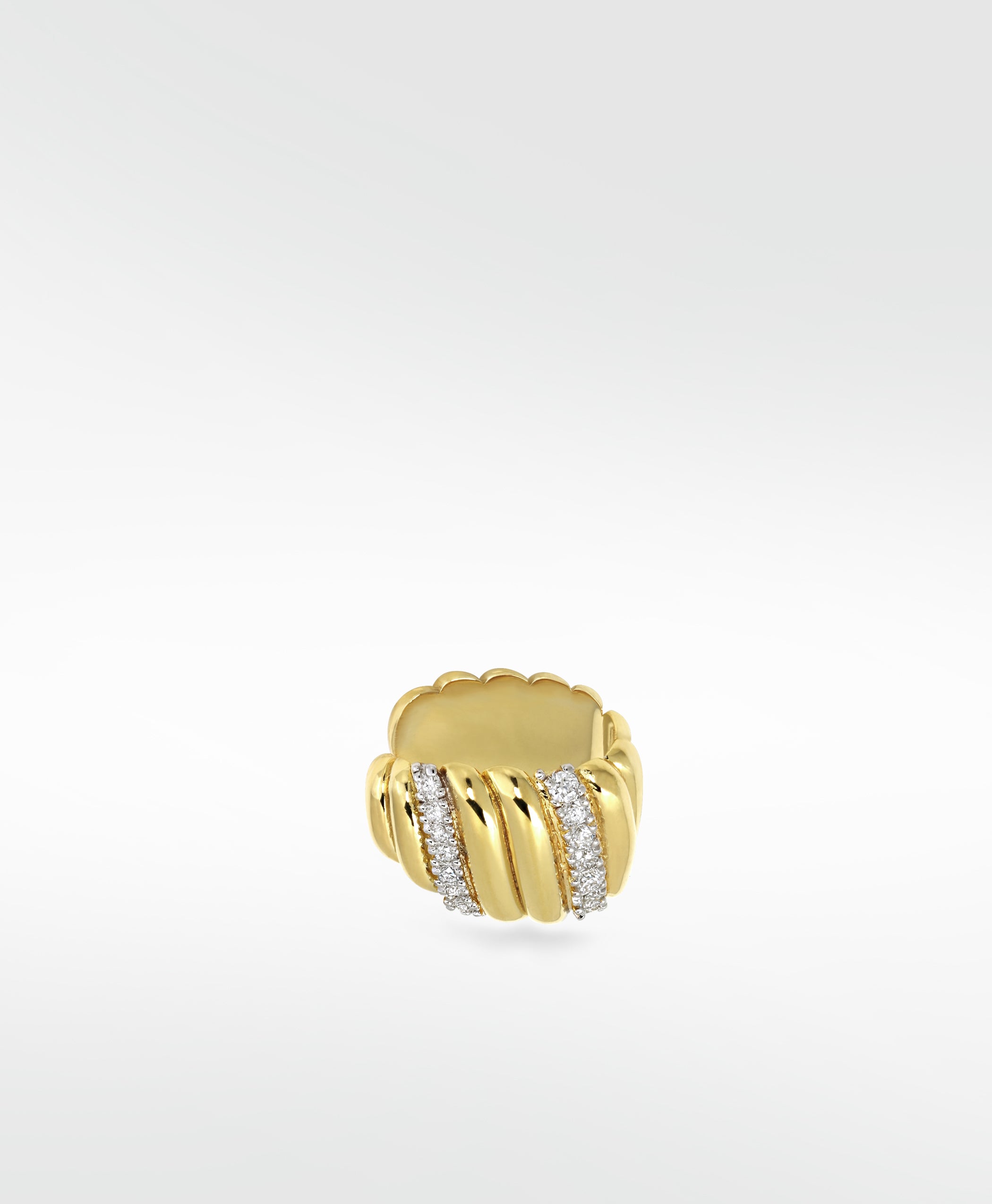 The Palm Diamond Ear Cuff in ridged yellow gold, featuring two sparkling bands of pavé diamonds on a white background.