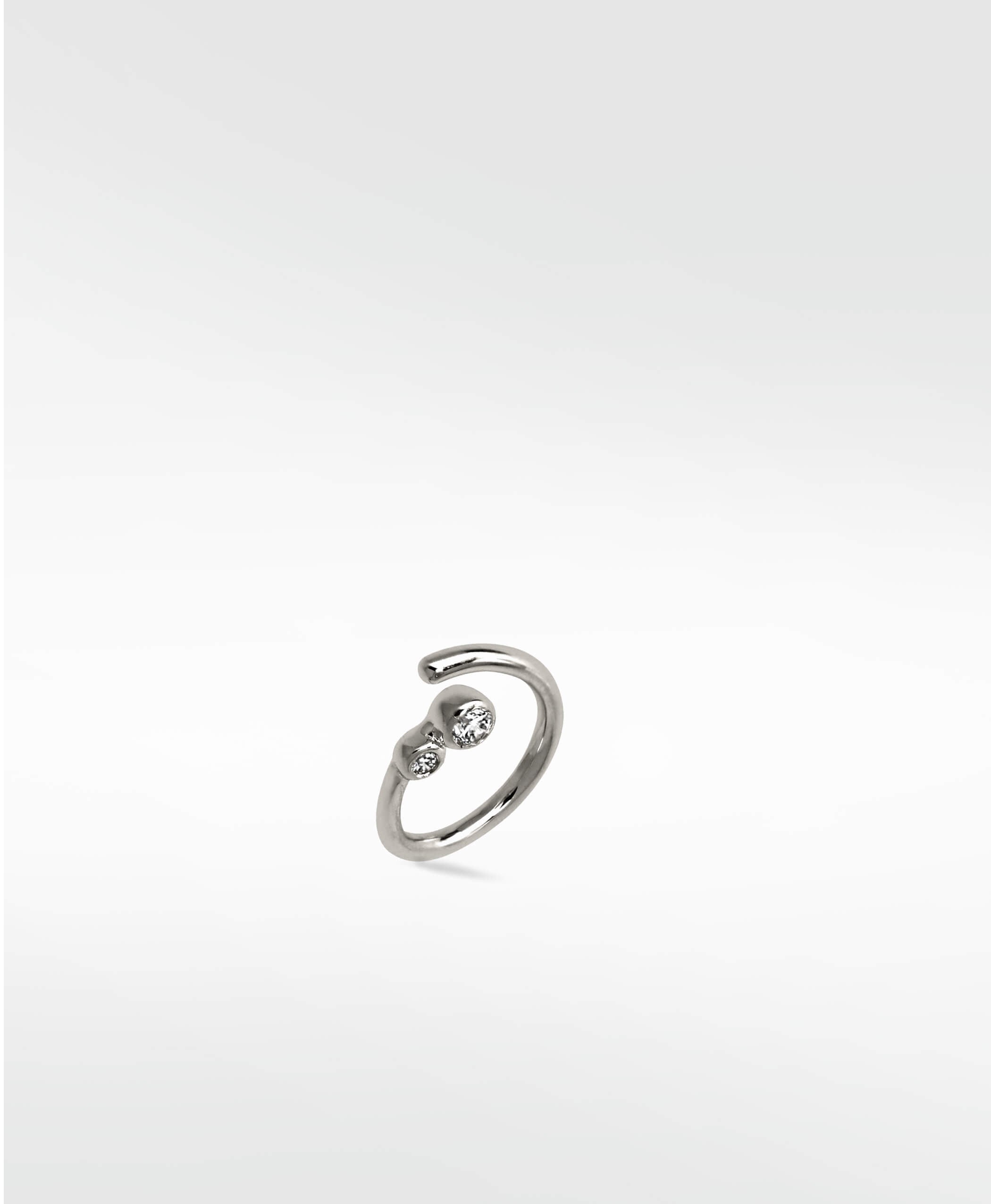 Lark & Berry's Interstellar Nocturnal Curative Hoop earring in 14k white gold with two brilliant lab-grown diamonds.