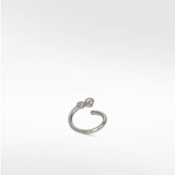 The Interstellar Nocturnal Curative Hoop earring in white gold, with two brilliant created diamonds on an open cuff design.