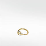 The Interstellar Nocturnal Curative Hoop earring in yellow gold, featuring two bezel-set, lab-grown diamonds.